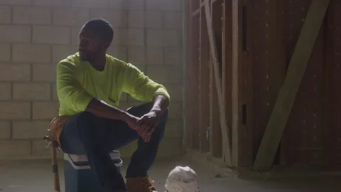 Construction Worker Sits On Cooler At Job Site Stock Footage 270391155
