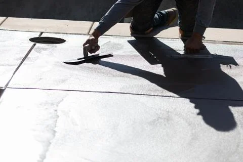Construction Worker Smoothing Wet Cement With Trowel Tools Stock Photos