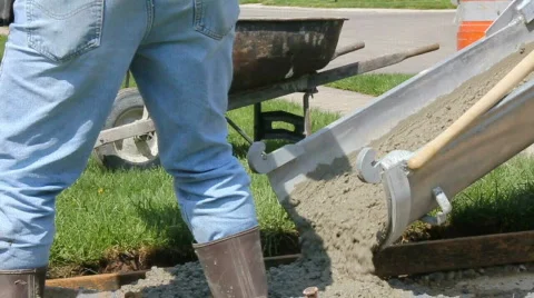 Construction worker spreading concrete Video stock 707709