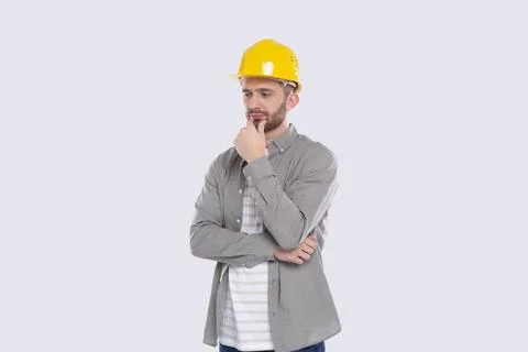 Construction Worker Standing Thinking. Architect Analysing Work. Man Standing in Stock Photos