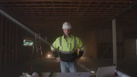 Construction Worker Stands With Hands On Hips At Job Site Stock Footage 270388726
