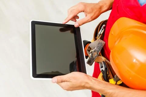 Construction Worker with a tablet. Planning Developer Concept Foto stock