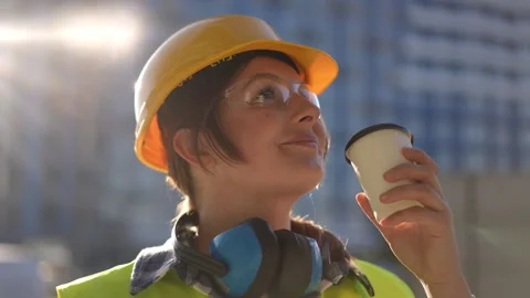 Construction Worker Taking Well Deserved Coffee Break While in Full Safety Gear Stock Footage 311861589