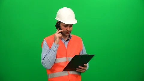 Construction Worker Talking Phone with Notes Stock Footage 88652703