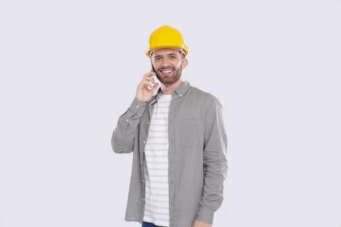 Construction Worker Talking on Phone Standing Isolated. Commecial, Shopping Stock Photos