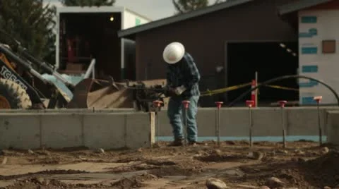 Construction worker with tamper 스톡 동영상 21556351