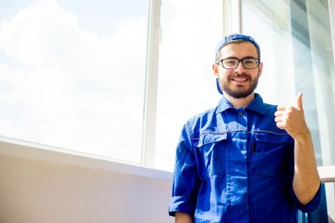 Construction worker thumbs up Stock Photos