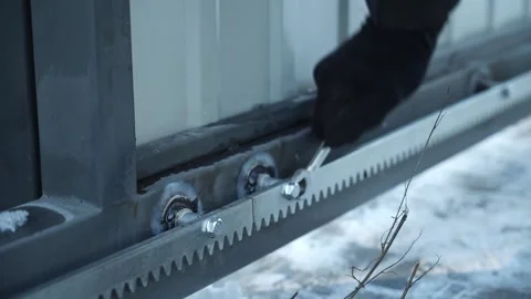 Construction worker tightens a Bolt with a metal Wrench Stock Footage 263801792