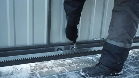 Construction worker tightens a Bolt with a metal Wrench Stock Footage 263801796