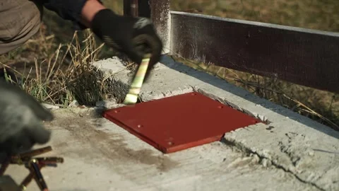 Construction worker tightens a Bolt with a metal Wrench Stock Footage 268794520
