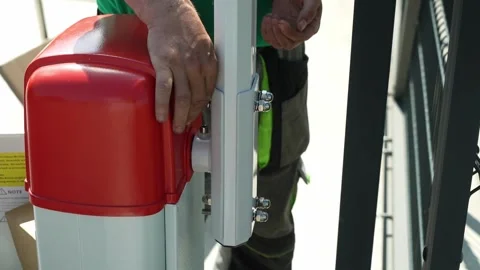 Construction worker tightens a Bolt with a metal Wrench Stock Footage 277413273