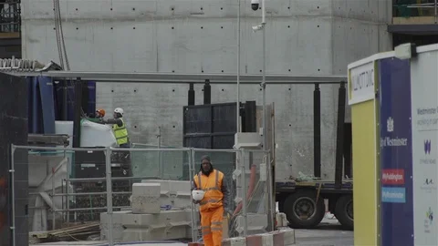 Construction worker tossing safety helmet from hand to hand Stock Footage 93202588