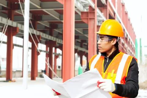 Construction worker under new building Stock Photos