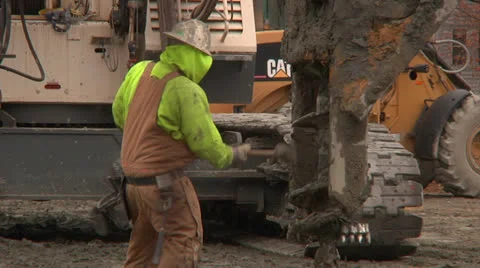 Construction worker uses sledgehammer in slow motion Stock Footage 24187424