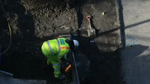 Construction worker using angle grinder Stock Footage 21843719