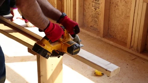 Construction Worker Using a Circular Saw Stock Footage 81751535