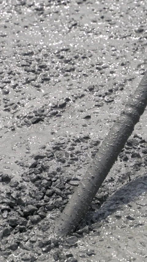 Construction worker using concrete vibrator removal air bubbles Stock Footage 313376826