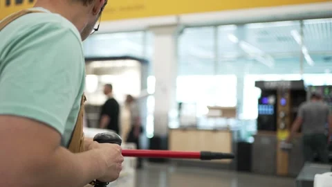Construction worker using digital scanning tool at modern hardware store self Stock Footage 310905366