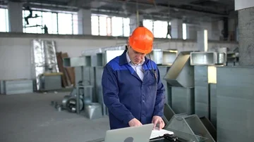 Construction worker using digital tablet on work site. slow-motion Stock Footage 85871249