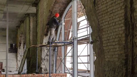 Construction Worker Using Drill To Install Window timelapse Stock Photos