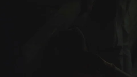 Construction worker using grinder in the dark Stock Footage 69766748