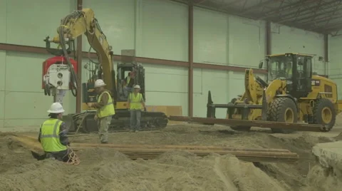 Construction Worker Using Metal Crow Bar On Construction Site 2 Stock Footage 46589561