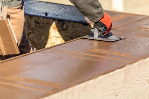 Construction Worker Using Stainless Steel Edger On Wet Cement Forming Coping  Stock Photos