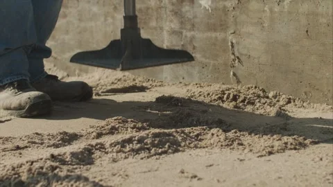 Construction Worker Using a Steel Tamper Stock-Footage 255856640