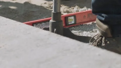 Construction Worker using a steel tamper Stock-Footage 255857335