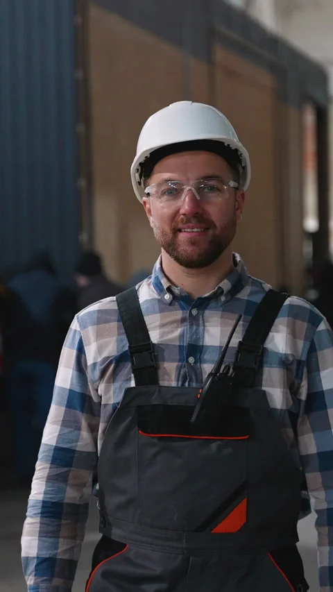 Construction worker walking through modular home factory Stock Footage 301828905