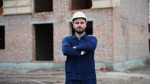 Construction worker walking at townhouse building site Stock Footage 300895260