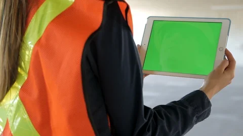 Construction Worker watching Tablet Green Screen, 4k Stock Footage 109465261