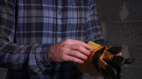 Construction worker wearing protection gloves Stock Footage 69806545