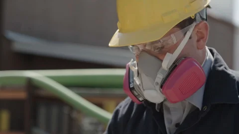 Construction worker wearing respirator Stock Footage 88961134