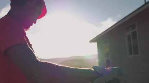 Construction worker wearing safety equipment standing near concrete pour Stock Footage 55154905