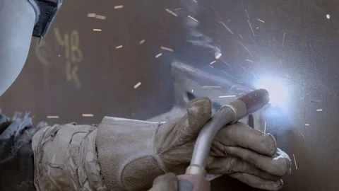 Construction worker welds a pipe Stock Footage 71124305