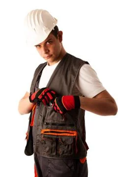 Construction worker in work dress isolated over white background Stock Photos