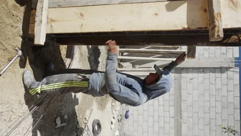 Construction worker working on building Stock Footage 232083169