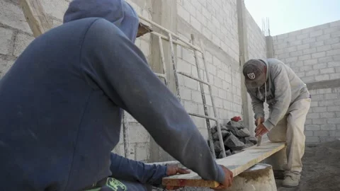 Construction worker working on building 스톡 동영상 232083371