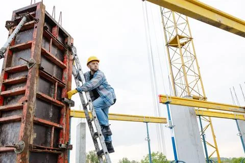 Construction worker working on a building formwork Stock Photos