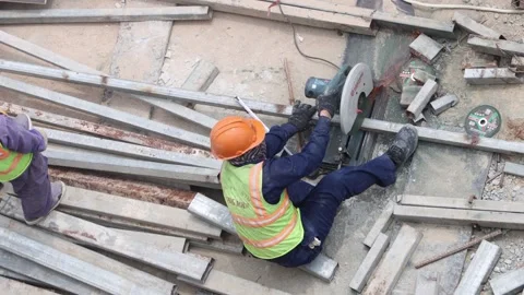 Construction worker working on a building framework. Stock Footage 340330877