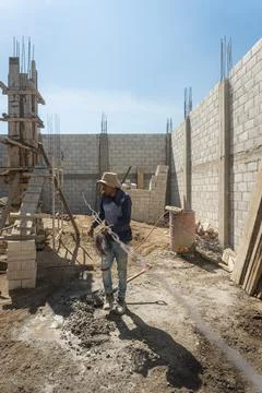 A construction worker working on building Stock-Fotos