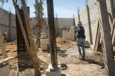 Construction worker working on building Stock Photos