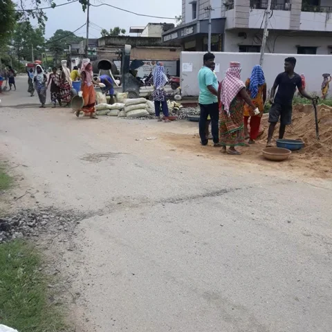 Construction worker working in concrete mixing machine. Stock Footage 235430534