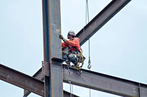 Construction worker working on highrise building construction worker worki... Stock Photos