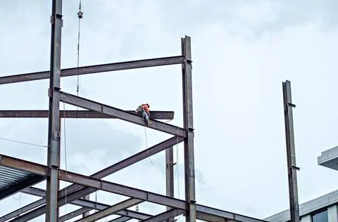 Construction worker working on highrise building construction worker worki... Stock Photos