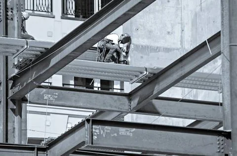 Construction worker working on highrise building construction worker worki... Stock Photos