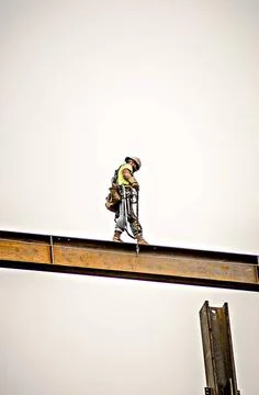 Construction worker working on highrise building construction worker worki... Stock Photos
