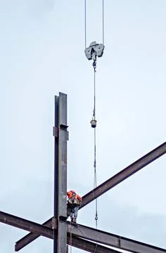 Construction worker working on highrise building construction worker worki... Stock Photos