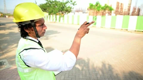 Construction worker writing on clipboard Stock Footage 277036434